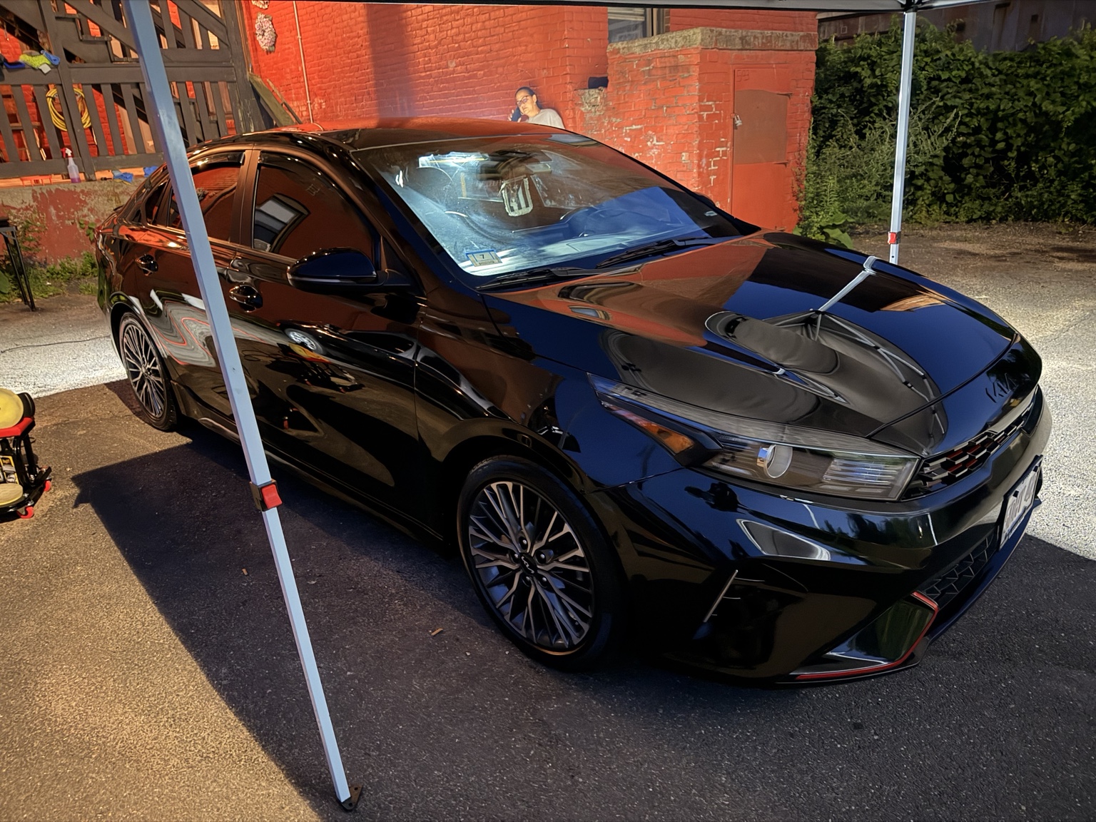 Black Kia after paint correction and exterior detailing